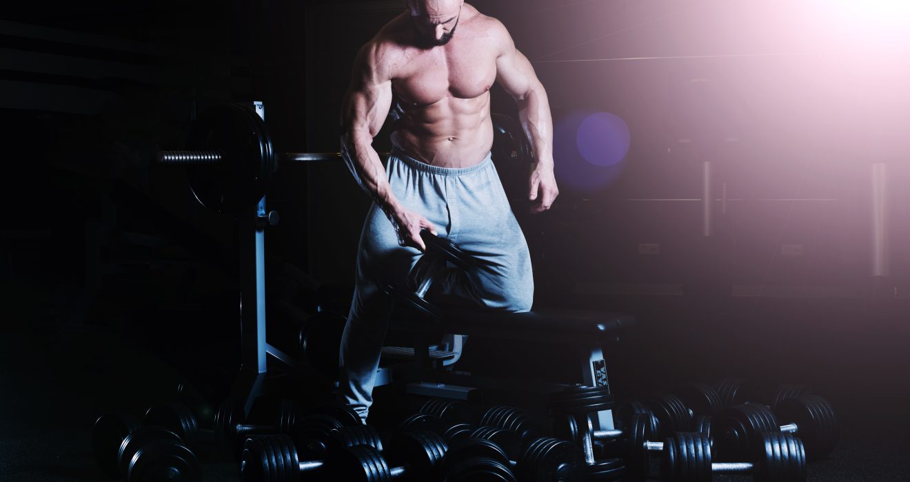 Man ready to do dips with Steroids Online training program